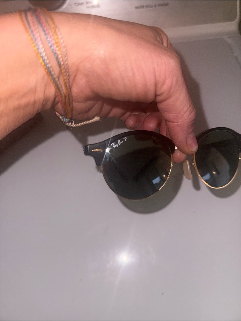 Ray-Ban Black and Gold Round Sunglasses with Dark Lenses